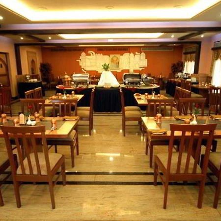 Aj International Hotel Bengaluru Étterem fotó