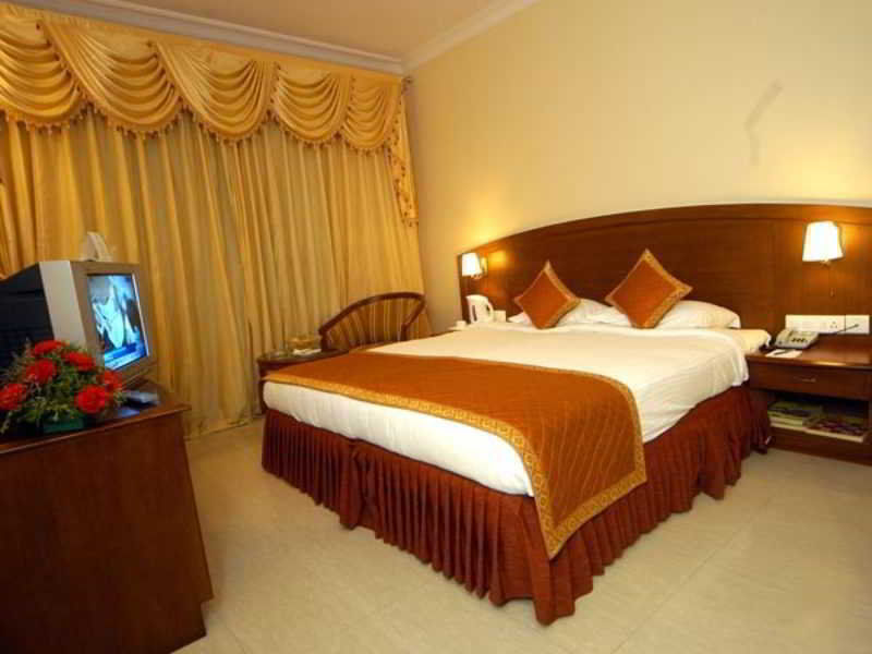 Aj International Hotel Bengaluru Szoba fotó